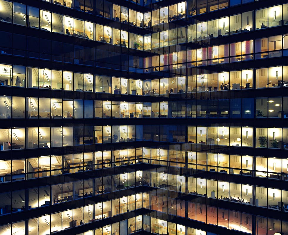 exterior view of an office building at night